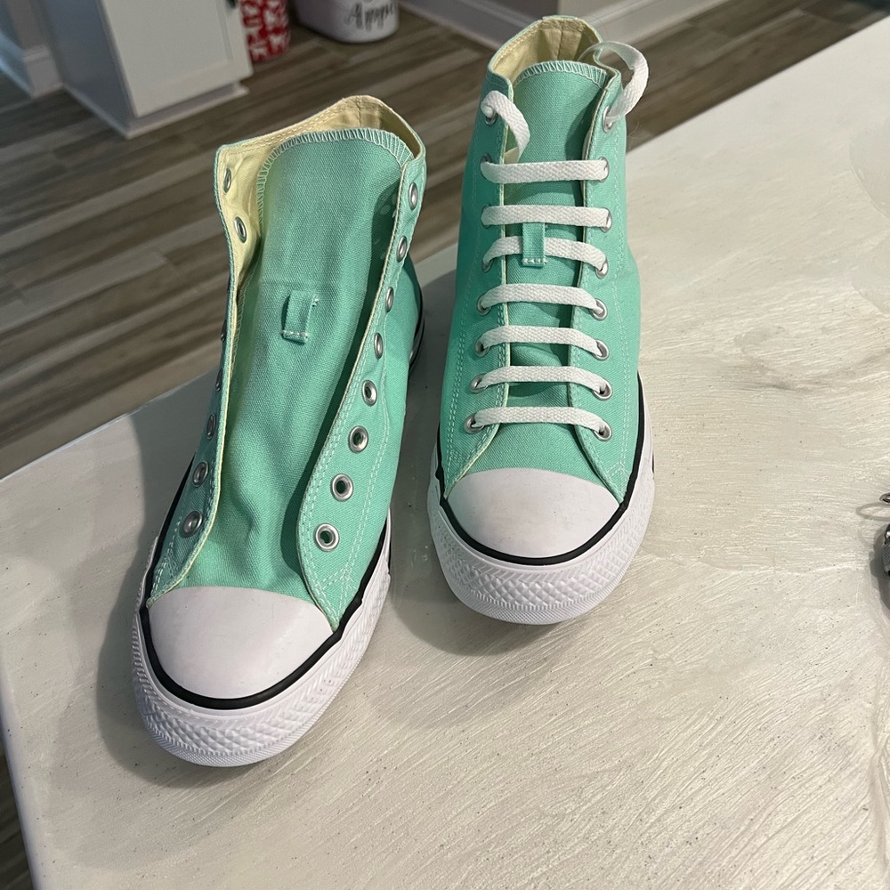 Brand new never worn high top Converse